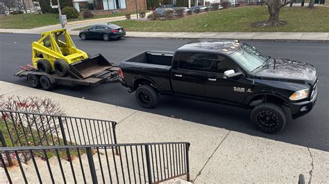 can a dodge ram 1500 tow a skid steer|how to tow a skid steer.